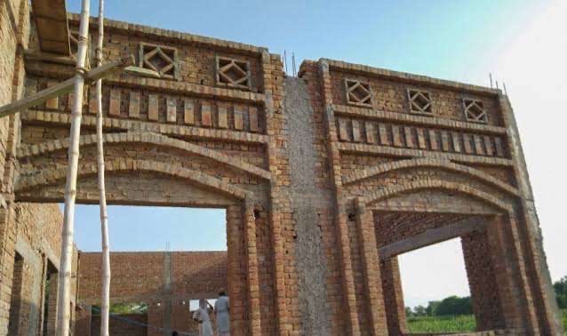 Mosque under construction in Pakistan, brickwork archways